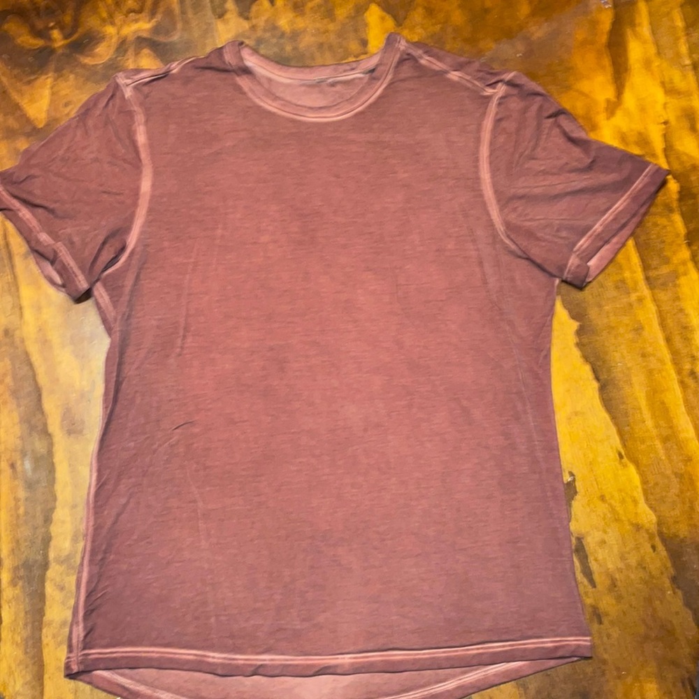 Mens burnt orange Lululemon shirt.
